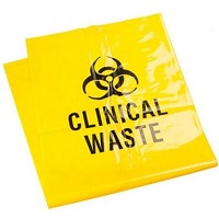 A yellow clinical waste bag wirh Bio Hazard symbol printed on it